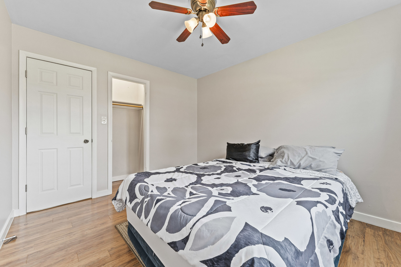439 Highview Avenue Elmhurst, IL 60126 - Photo 20 of 42 a bedroom with a bed and wooden floor