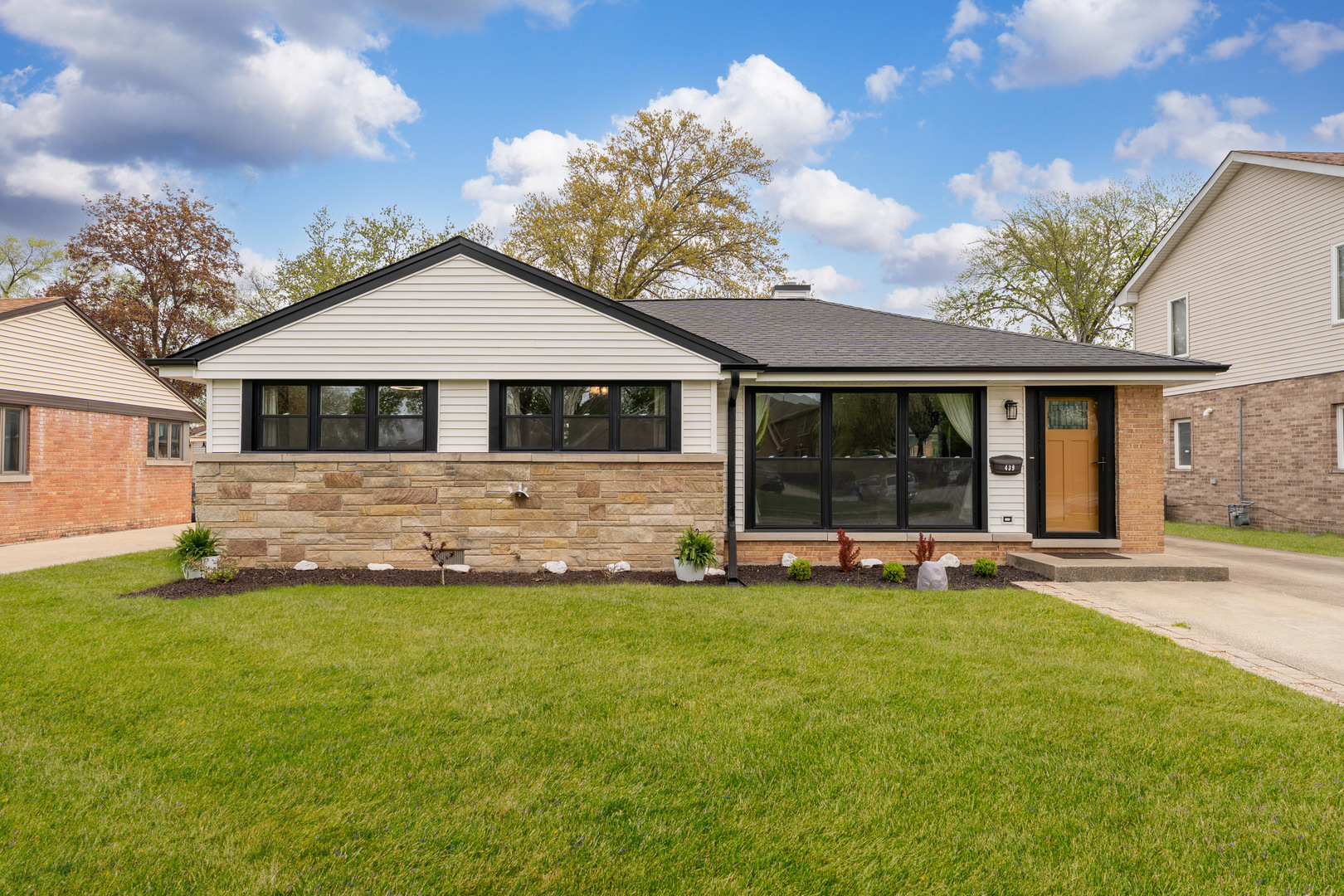 439 Highview Avenue Elmhurst, IL 60126 - Photo 2 of 42 a view of a house with a yard and sitting area