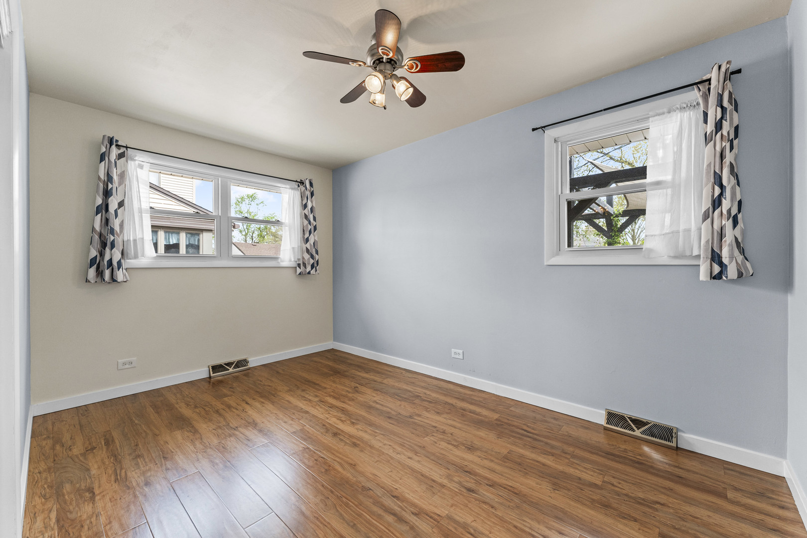 439 Highview Avenue Elmhurst, IL 60126 - Photo 21 of 42 a view of room with window and wooden floor