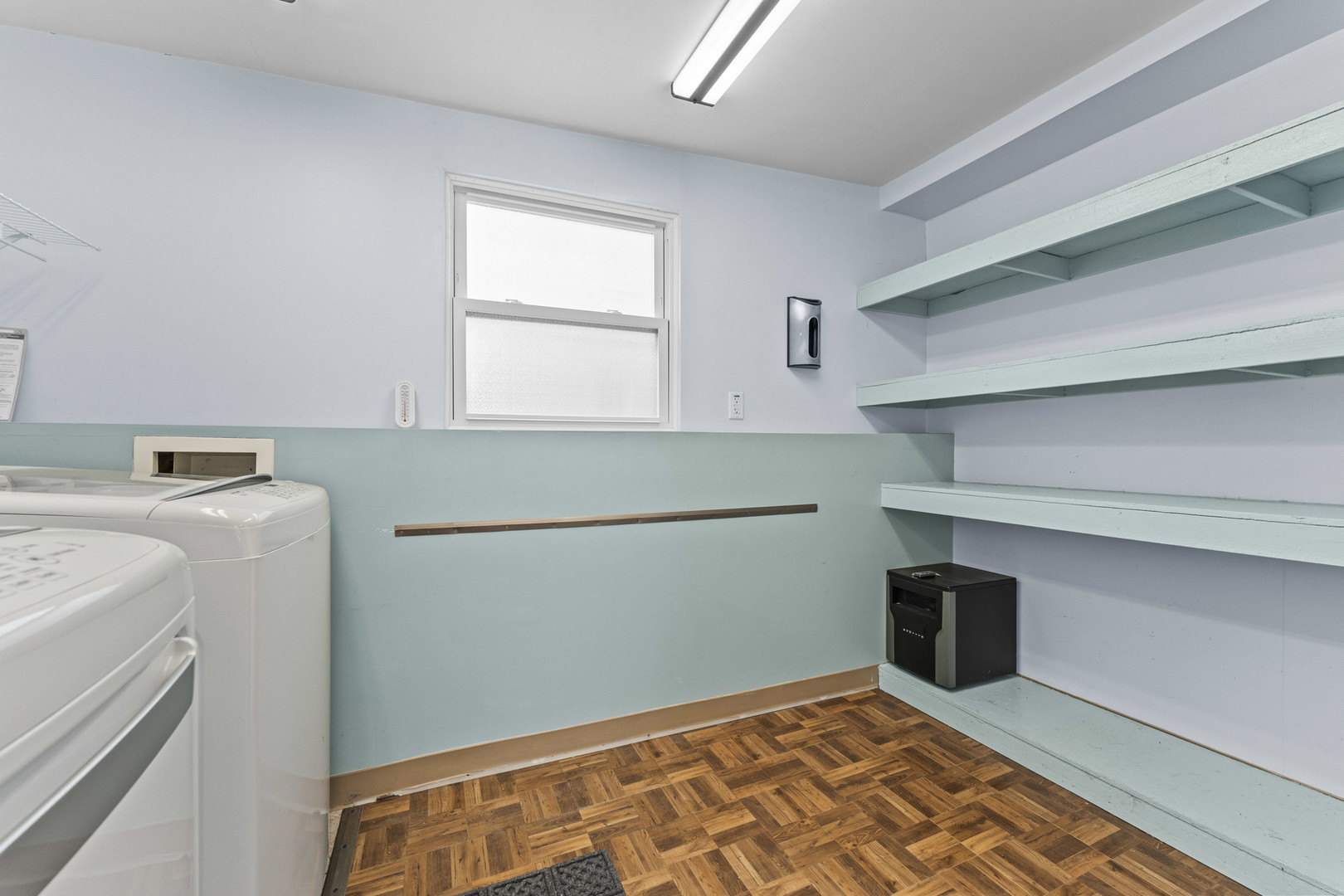 439 Highview Avenue Elmhurst, IL 60126 - Photo 26 of 42 a view of storage and utility room with washer and dryer