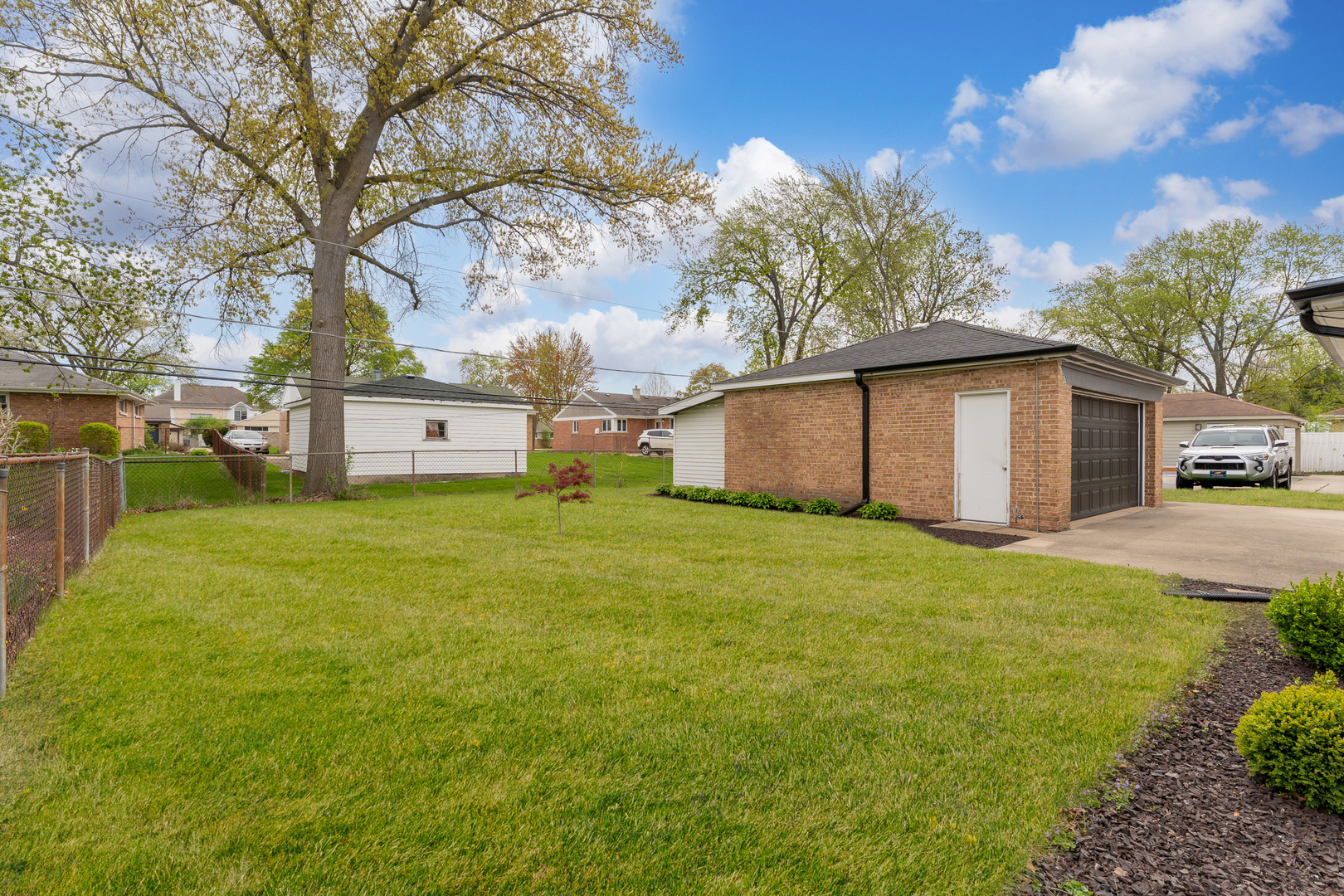 439 Highview Avenue Elmhurst, IL 60126 - Photo 31 of 42 a front view of house with yard and trees