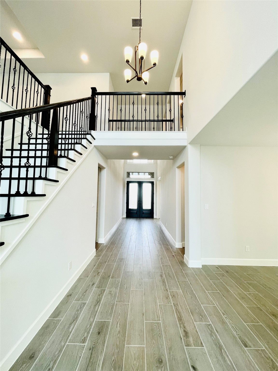 596 Santa Rosa Hls Drive Katy, TX 77493 - Photo 11 of 45 a view of entryway with wooden floor