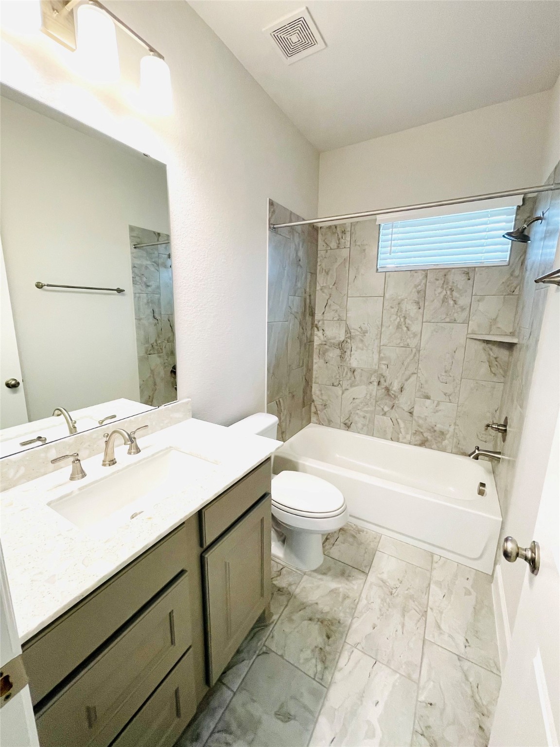 596 Santa Rosa Hls Drive Katy, TX 77493 - Photo 16 of 45 a bathroom with a sink a toilet and shower