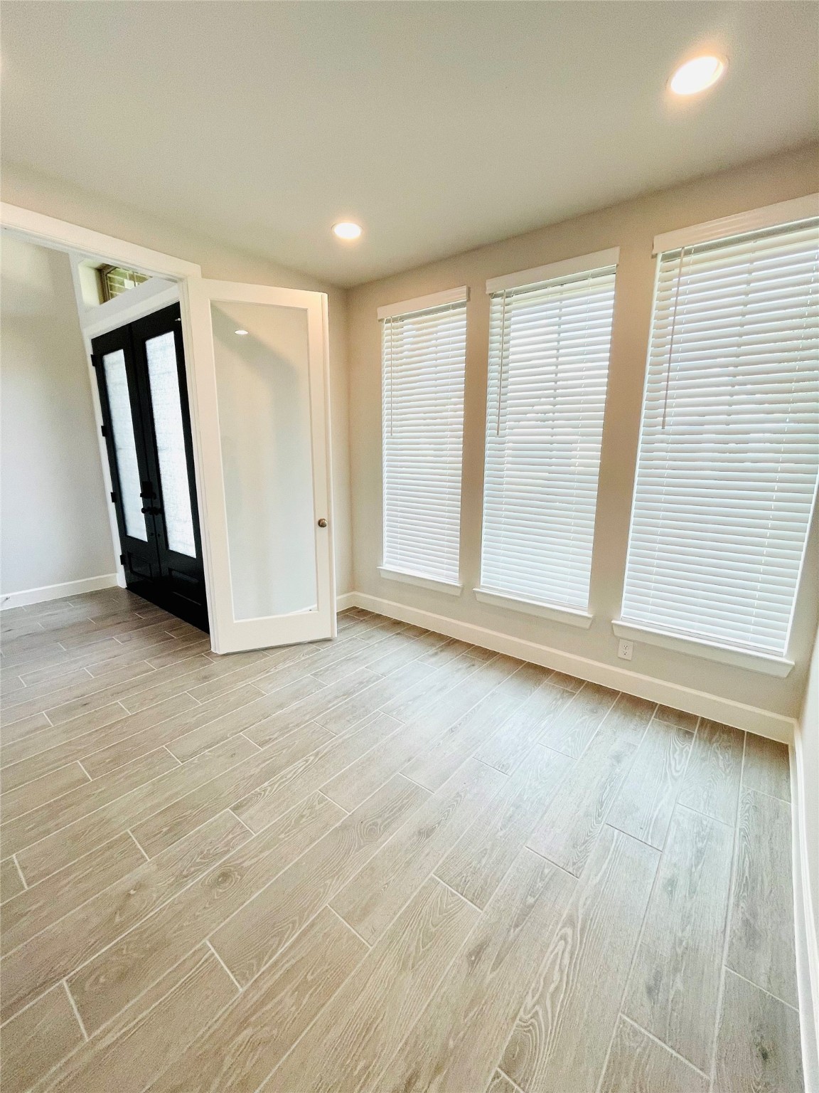 596 Santa Rosa Hls Drive Katy, TX 77493 - Photo 6 of 45 a view of an empty room with a window