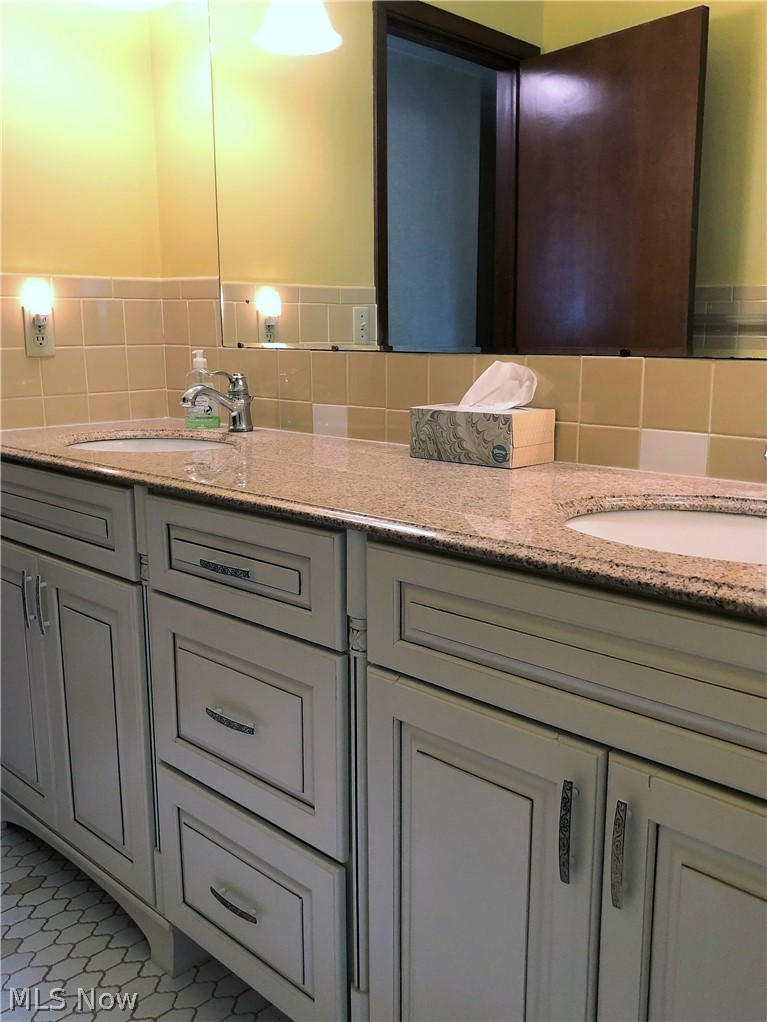 1587 Meadowlane Road Independence, OH 44131 - Photo 16 of 26 Updated Bath off Hallway has Kraftmaid Cabinet