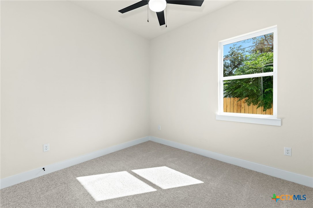 223 Allen Street Bartlett, TX 76511 - Photo 13 of 21 an empty room with a window