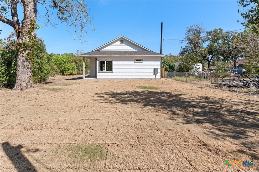 223 Allen Street Bartlett, TX 76511 - Photo 19 of 21 a view of a house with a yard