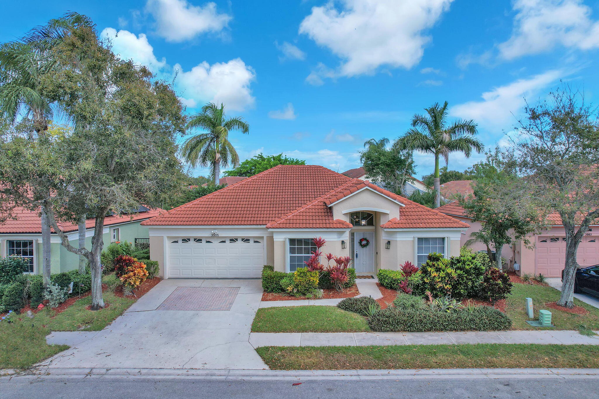3005 Casa Rio Court Riviera Beach, FL 33418 - Photo 2 of 52 2-web-or-mls-DJI_0895