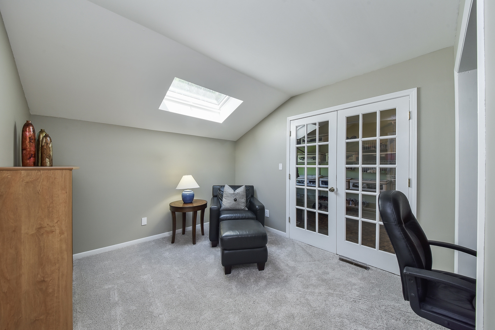 18 Wakefield Lane Geneva, IL 60134 - Photo 13 of 23 a living room with furniture and a large window