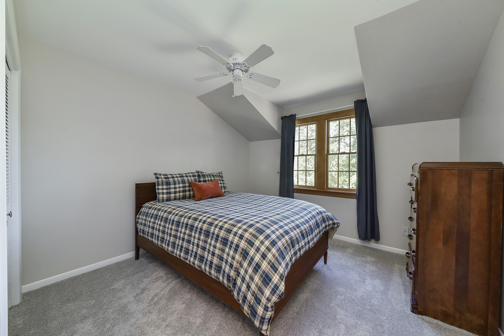 18 Wakefield Lane Geneva, IL 60134 - Photo 16 of 23 a bedroom with a bed and a window
