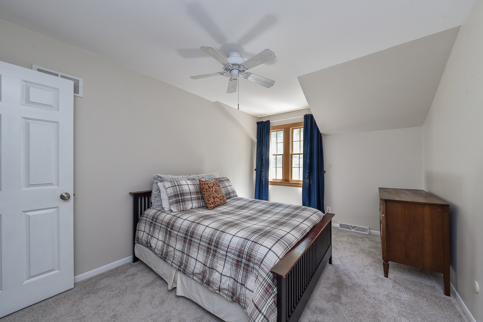 18 Wakefield Lane Geneva, IL 60134 - Photo 17 of 23 a bedroom with a bed and window