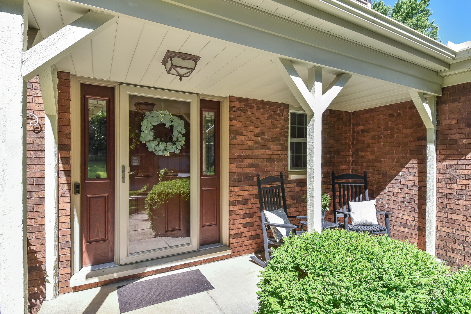 18 Wakefield Lane Geneva, IL 60134 - Photo 2 of 23 a view of a brick house with a large door