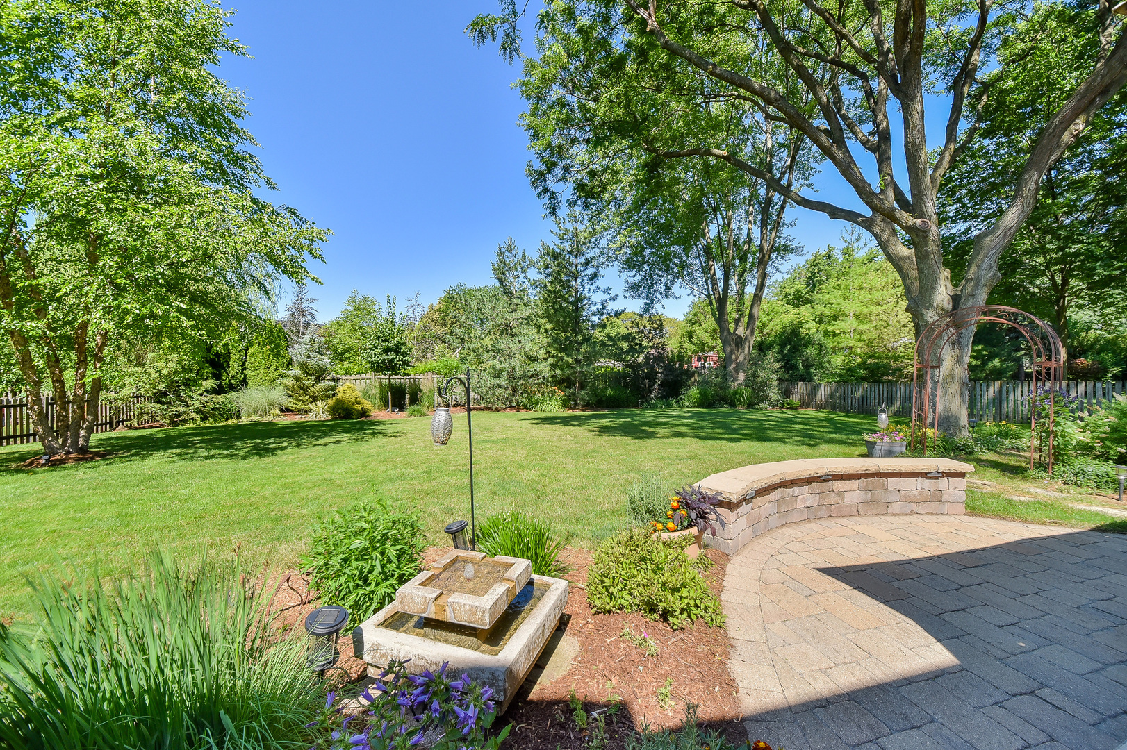 18 Wakefield Lane Geneva, IL 60134 - Photo 22 of 23 a view of a garden with plants