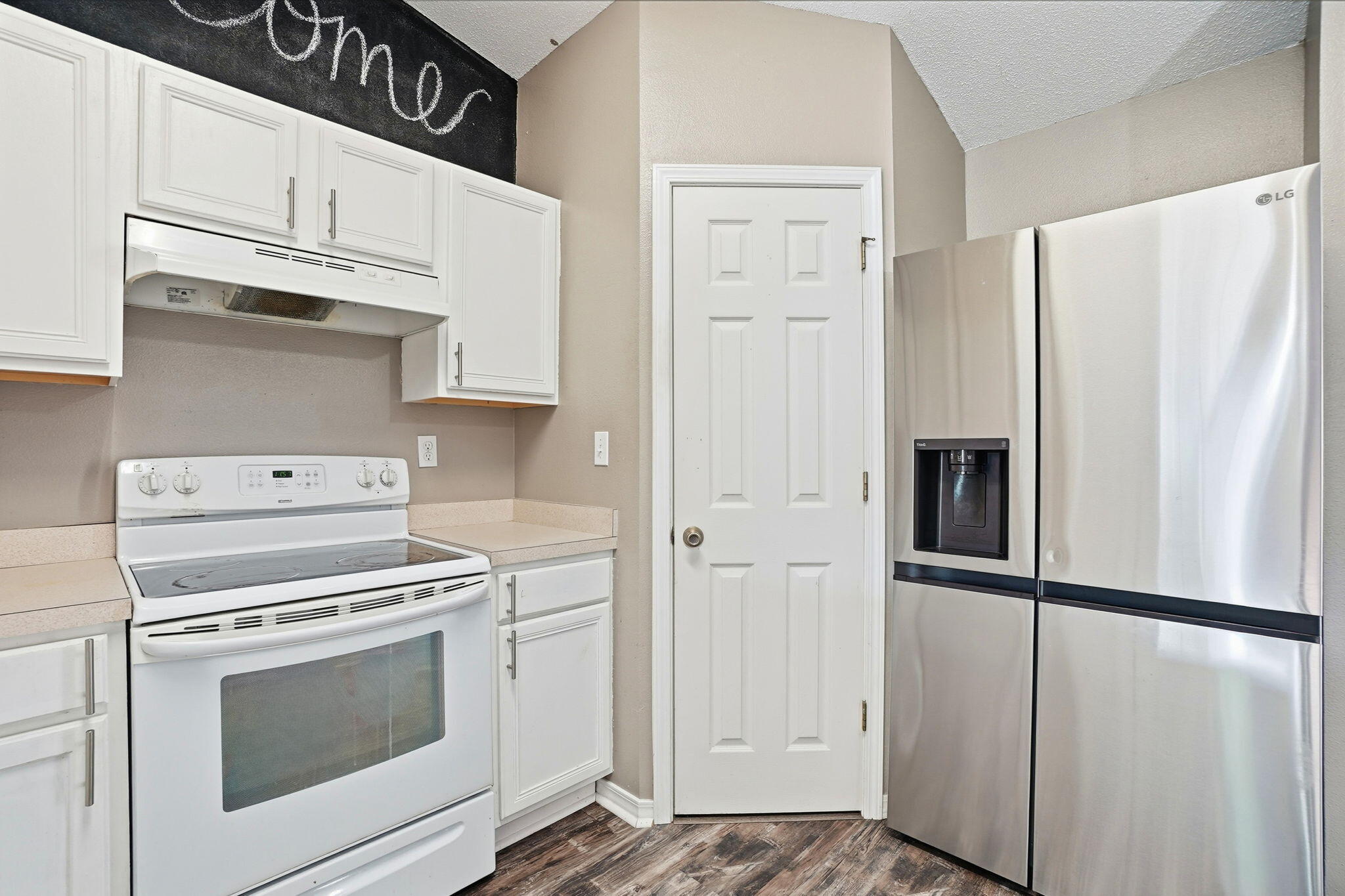 209 Cabana Way Crestview, FL 32536 - Photo 9 of 30 a kitchen with cabinets and stainless steel appliances