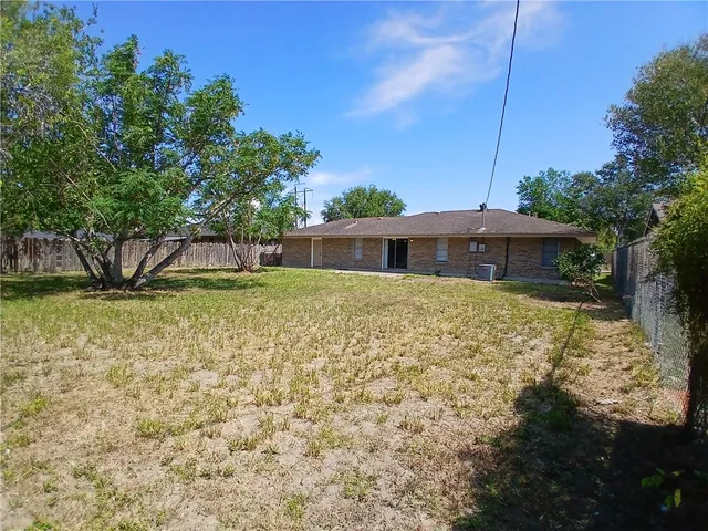 a house view with a garden space