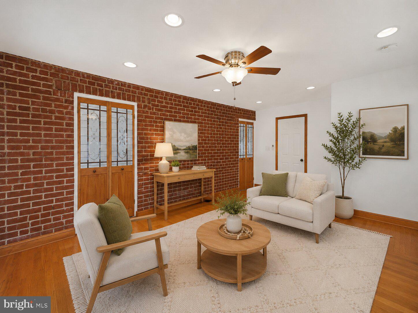 4504 20th Street Northeast Washington, DC 20018 - Photo 21 of 48 a living room with furniture and a large window