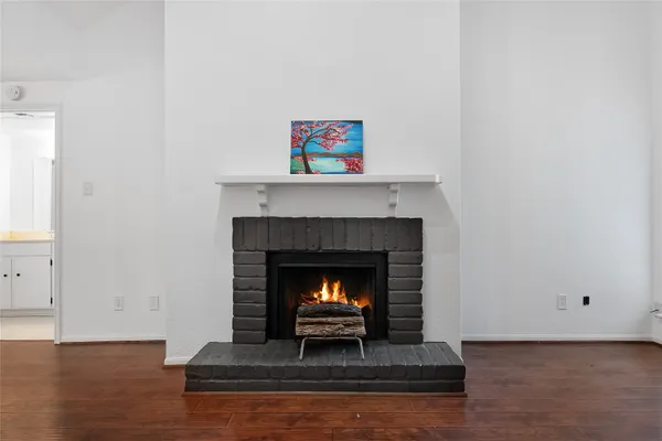 a living room with a fireplace