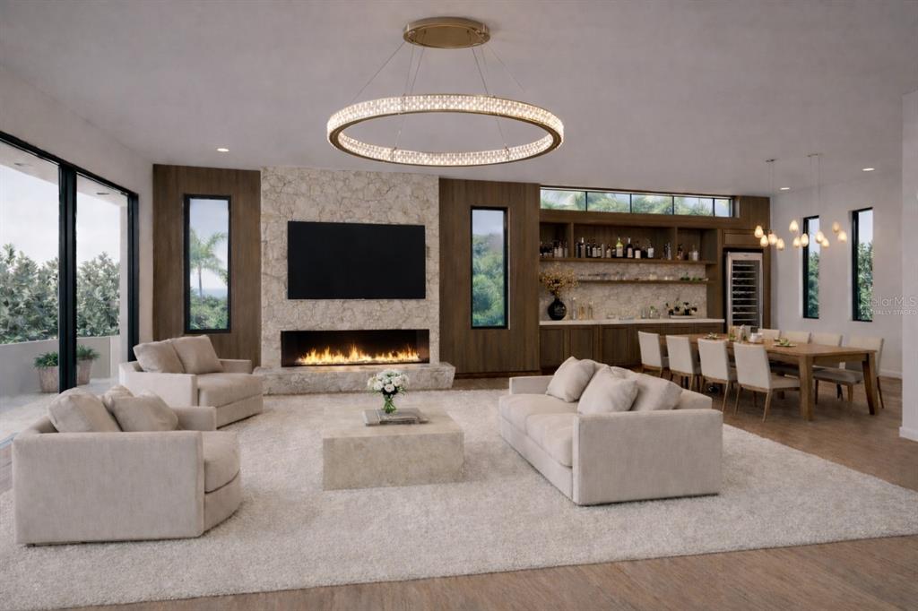 581 Hibiscus Way Longboat Key, FL 34228 - Photo 3 of 12 a living room with furniture and a fireplace