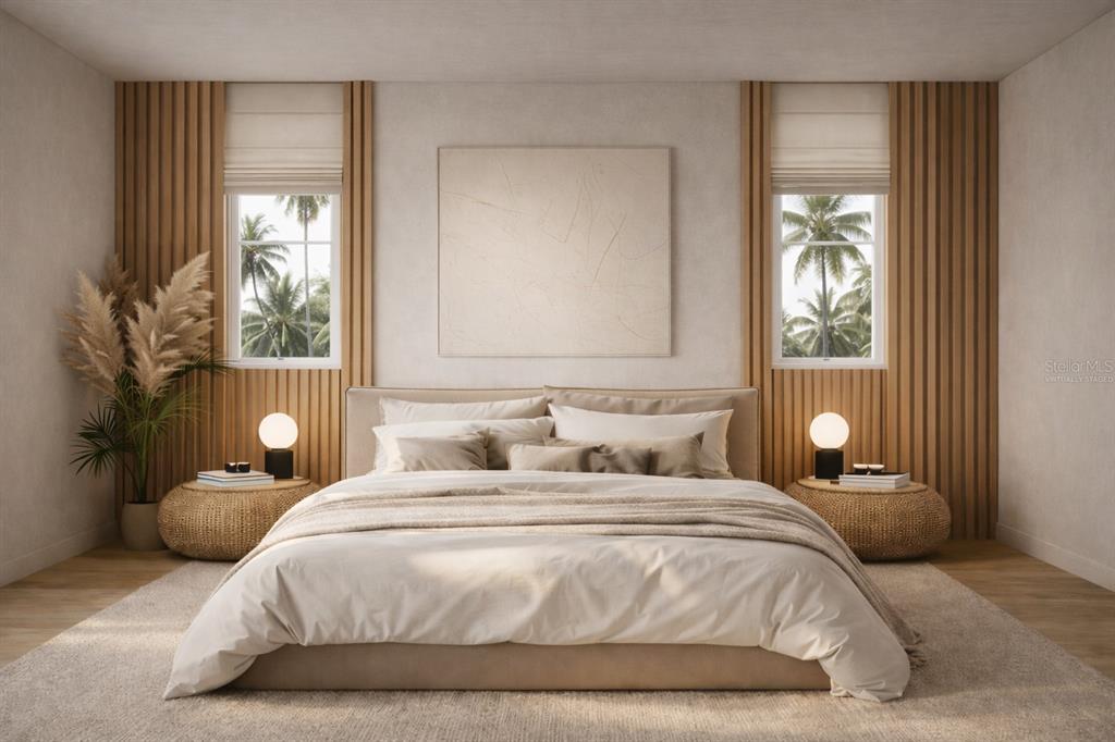 581 Hibiscus Way Longboat Key, FL 34228 - Photo 9 of 12 a bedroom with a large bed and a window