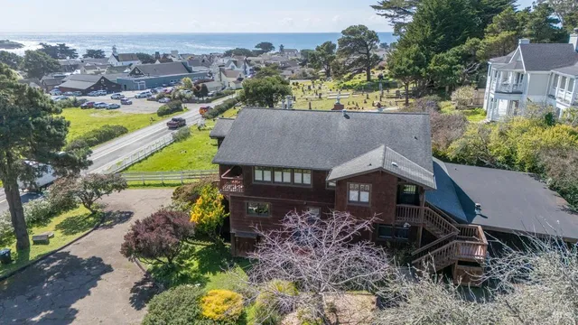 a bathroom with a toilet a sink and a mirror