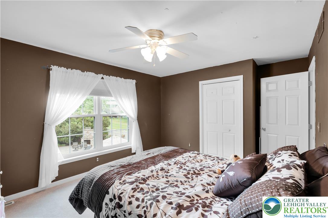 3830 McIntosh Drive Orefield, PA 18069 - Photo 19 of 36 a bedroom with a bed and a window