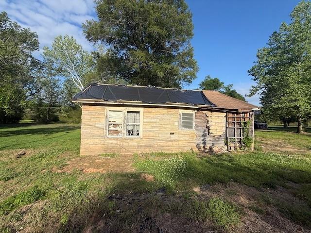 681 Smithville Road Sarepta, LA 71071 - Photo 28 of 39 a view of a house with a yard