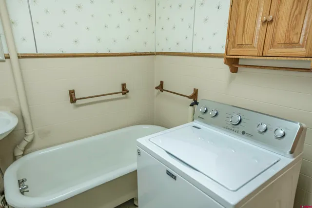 a bathroom with a sink and a bathtub