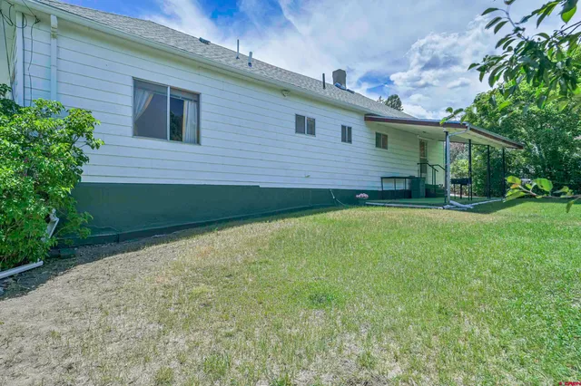 a view of a backyard with a garden