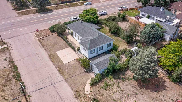 an aerial view of a city with lots of residential buildings