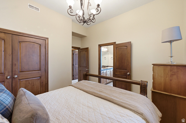 335 Bern Way Midway, UT 84049 - Photo 52 of 88 Neutral wall paint and a built-in closet with double wood-finish doors