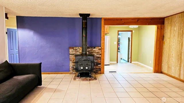 a view of a livingroom with a couch and chandelier