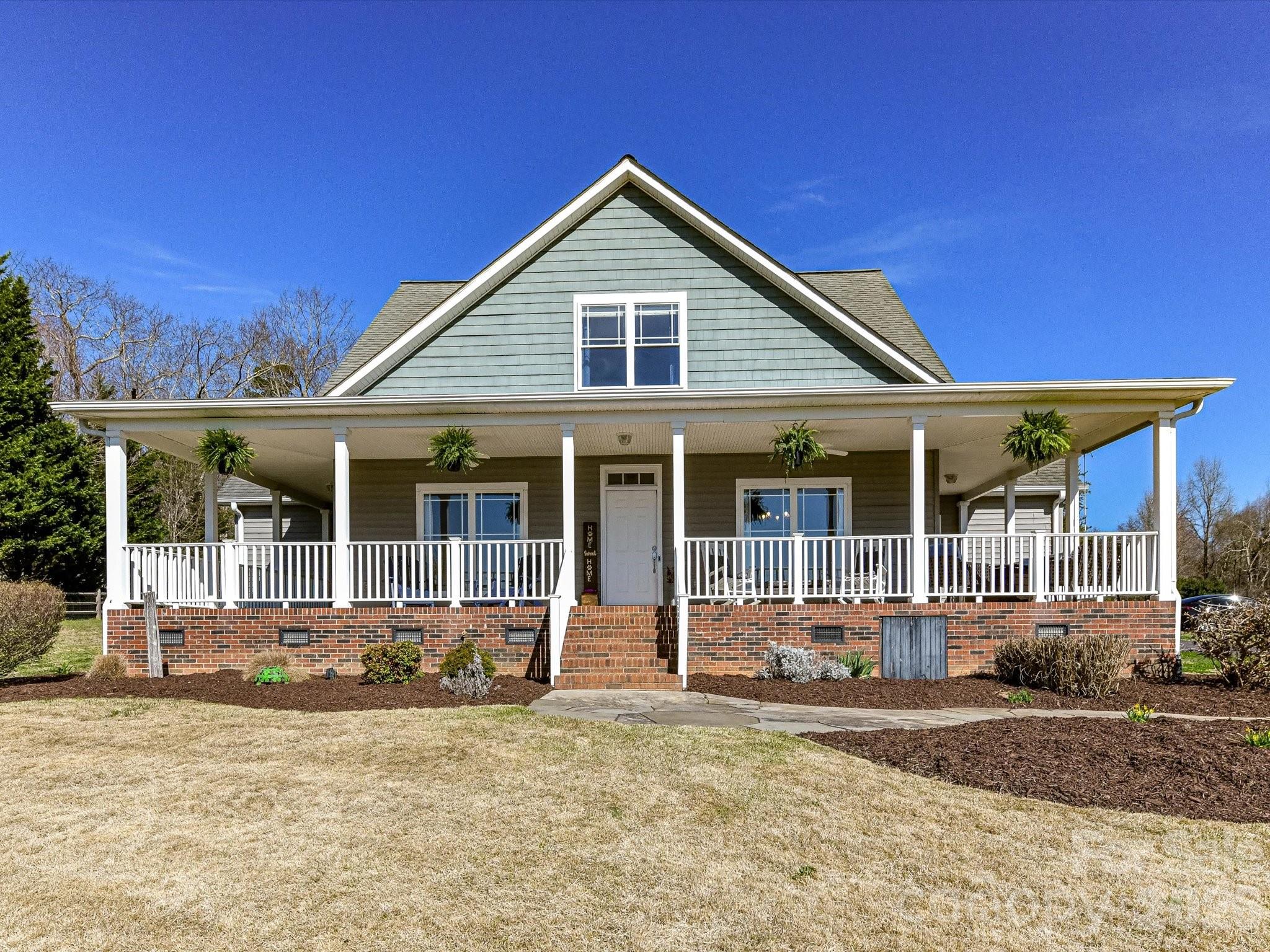 4566 Little Mountain Road Catawba, NC 28609 - Photo 14 of 47 front view of a house with a yard