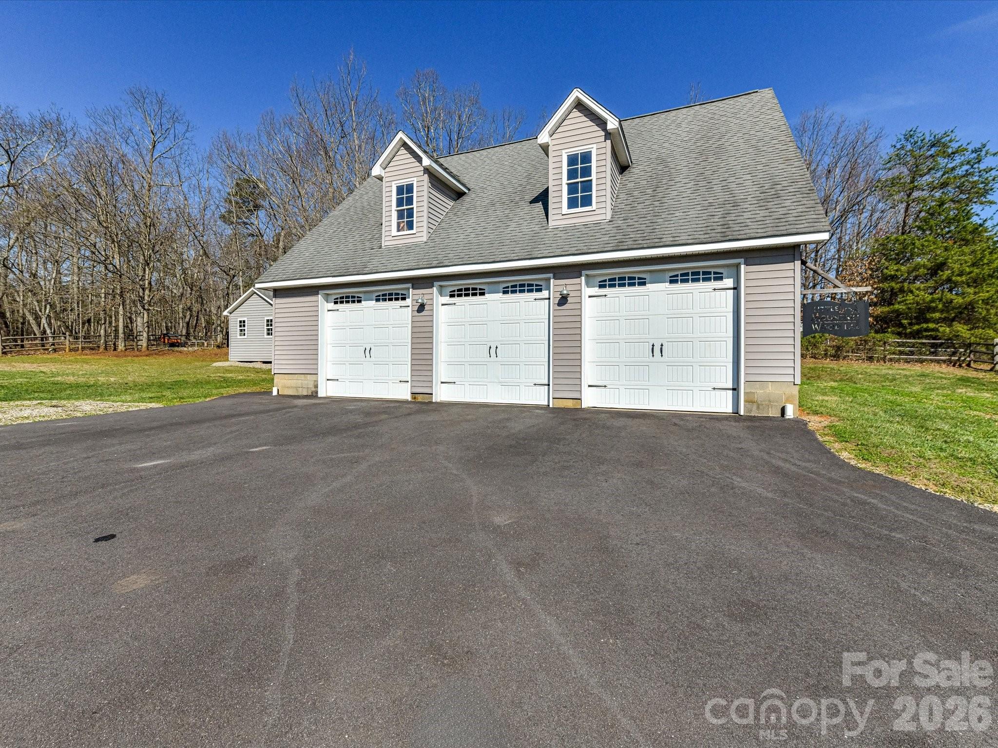 4566 Little Mountain Road Catawba, NC 28609 - Photo 17 of 47 a front view of a house with a yard and garage