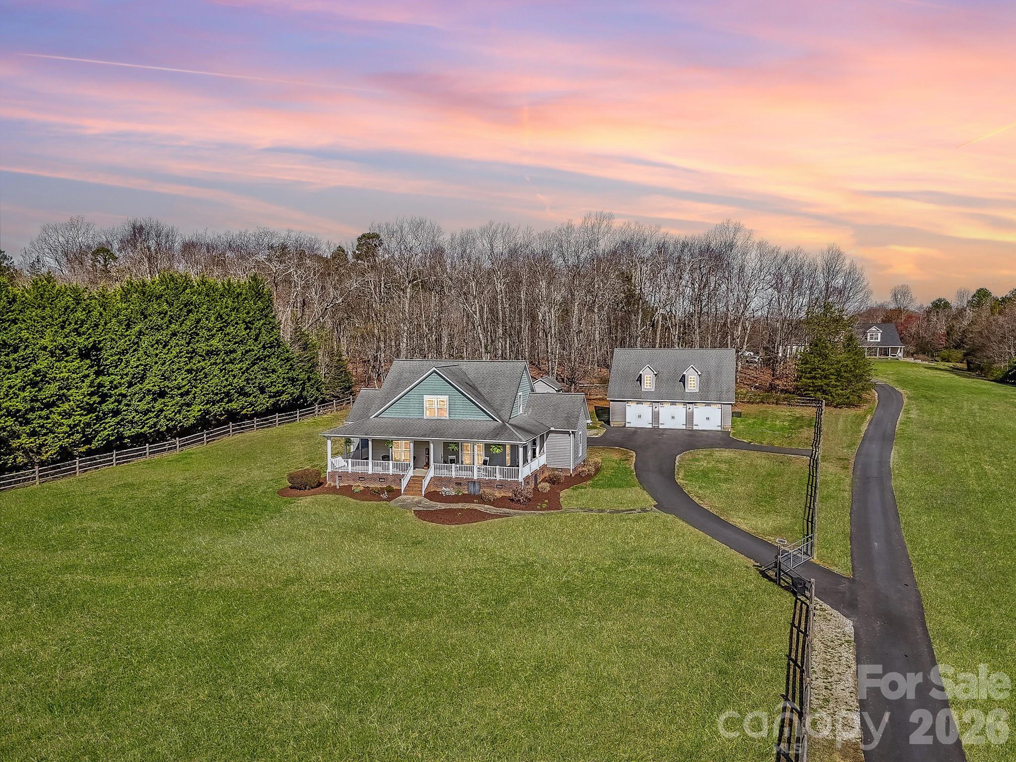 4566 Little Mountain Road Catawba, NC 28609 - Photo 22 of 47 a view of a swimming pool with a garden and mountain view