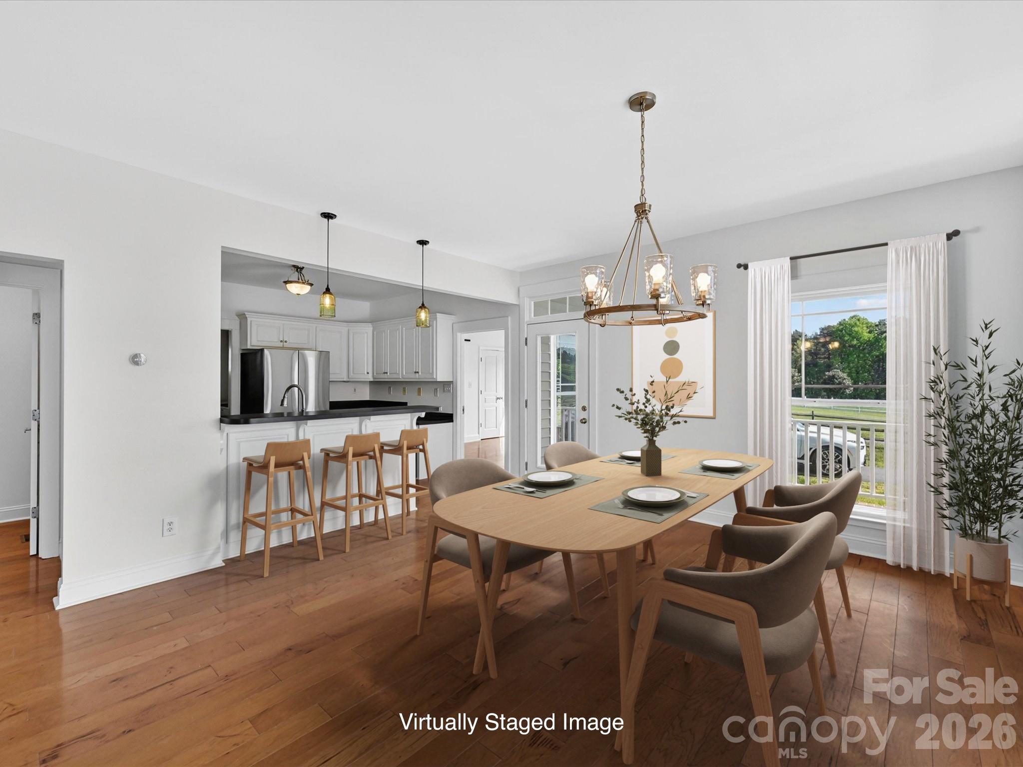 4566 Little Mountain Road Catawba, NC 28609 - Photo 28 of 47 a dining room with furniture window and wooden floor