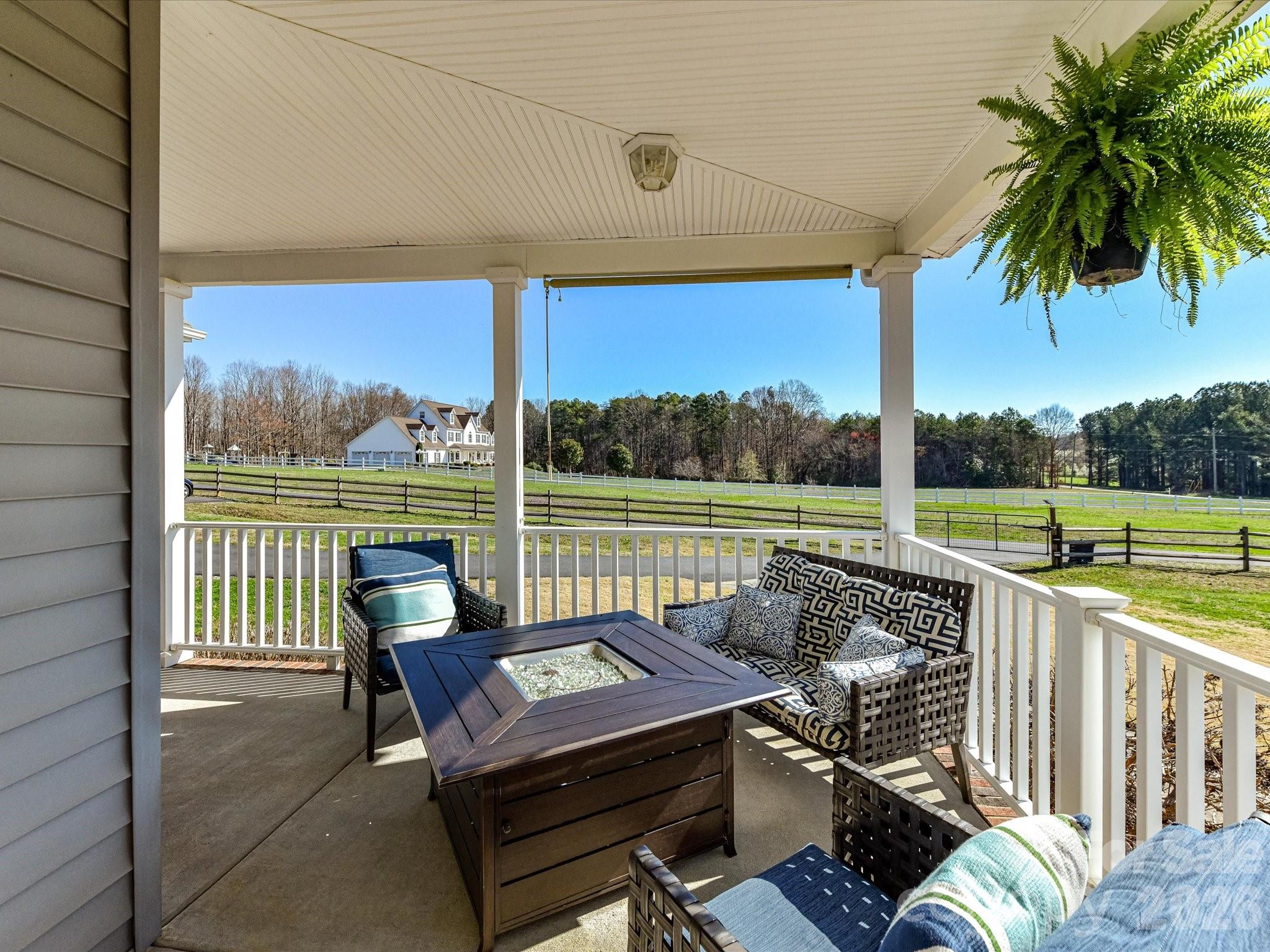 4566 Little Mountain Road Catawba, NC 28609 - Photo 10 of 47 a view of a chair and tables in the balcony