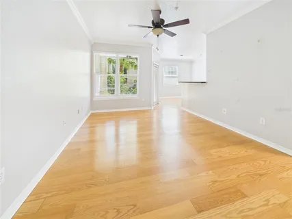 a view of an empty room with a window