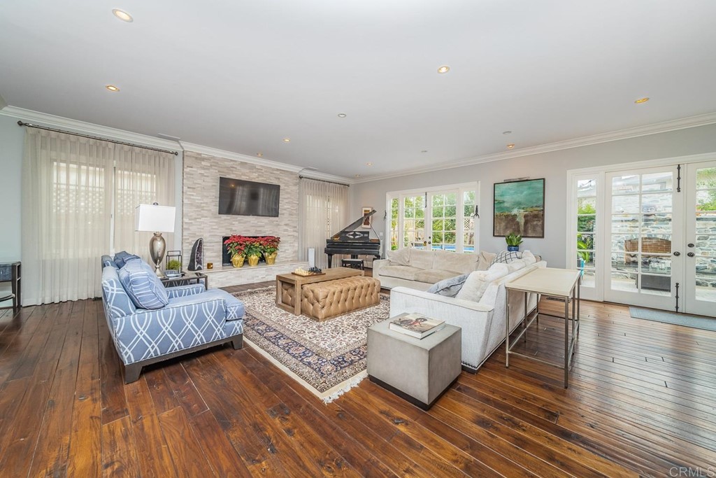 7695 Hillside Drive La Jolla, CA 92037 - Photo 12 of 39 Open concept, large room combined with dining and flows to outdoor entertainment area