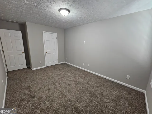 an empty room with a natural light