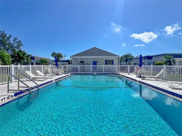 a view of a house with a swimming pool