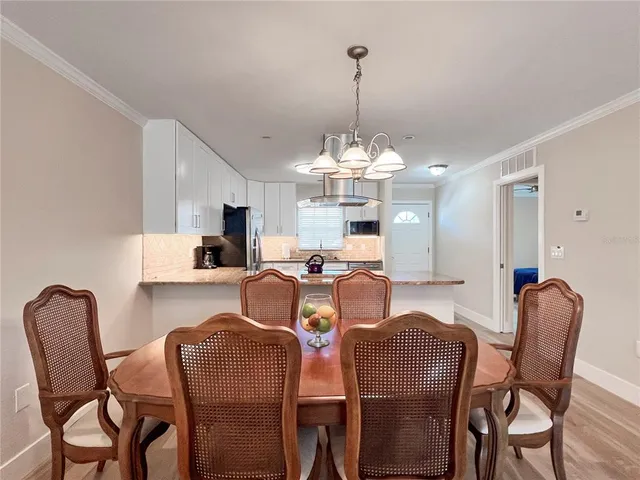 a view of a dining room with furniture