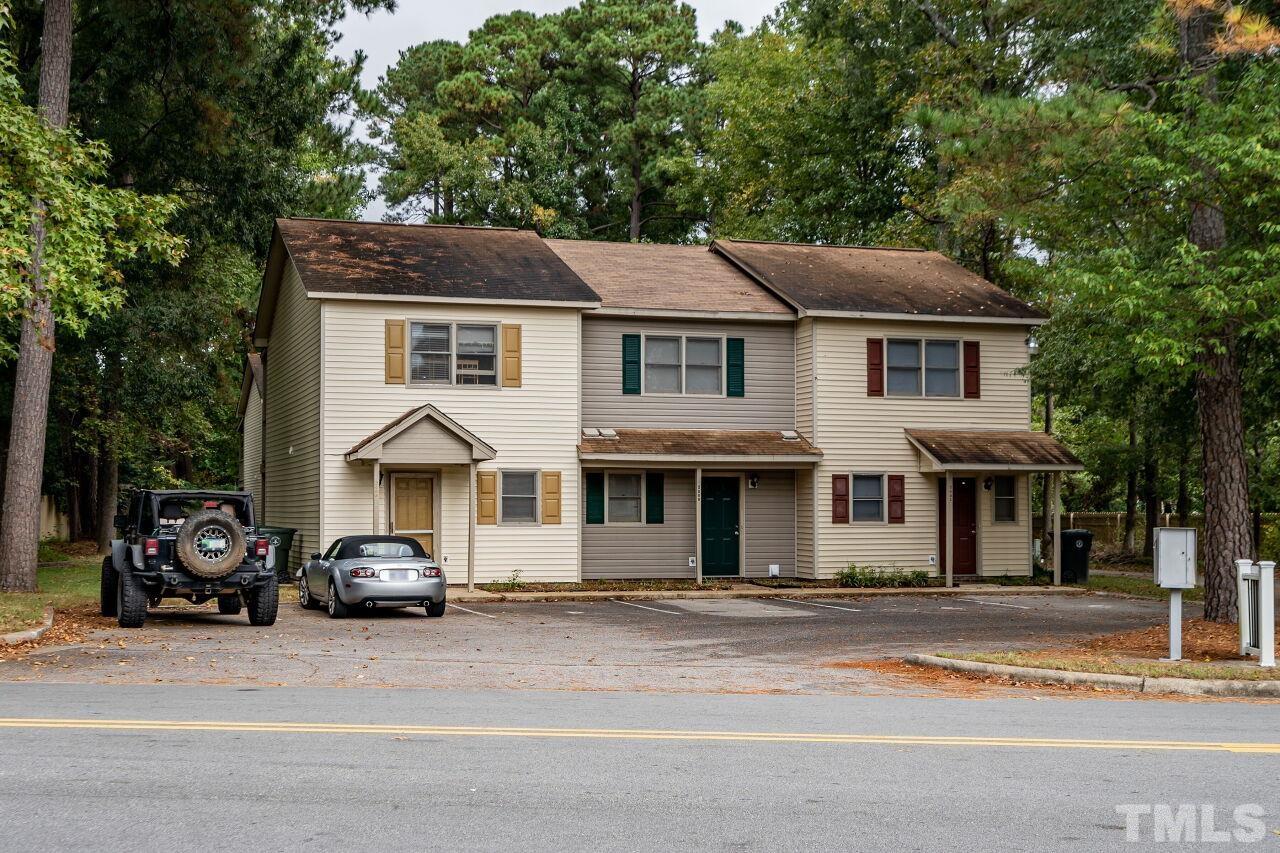 500 Forest Drive Garner, NC 27529 - Photo 2 of 9 a car parked in front of a house