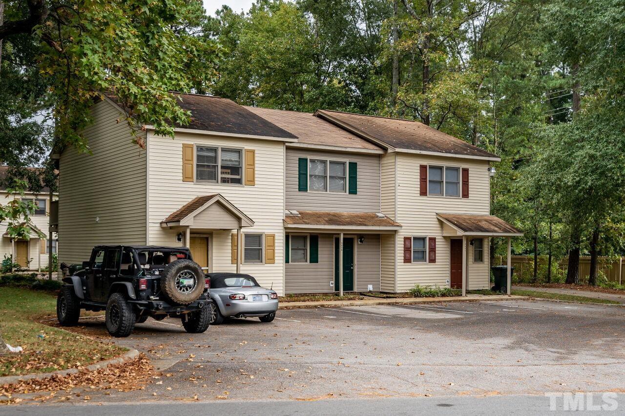 500 Forest Drive Garner, NC 27529 - Photo 3 of 9 a view of a white house and a many windows