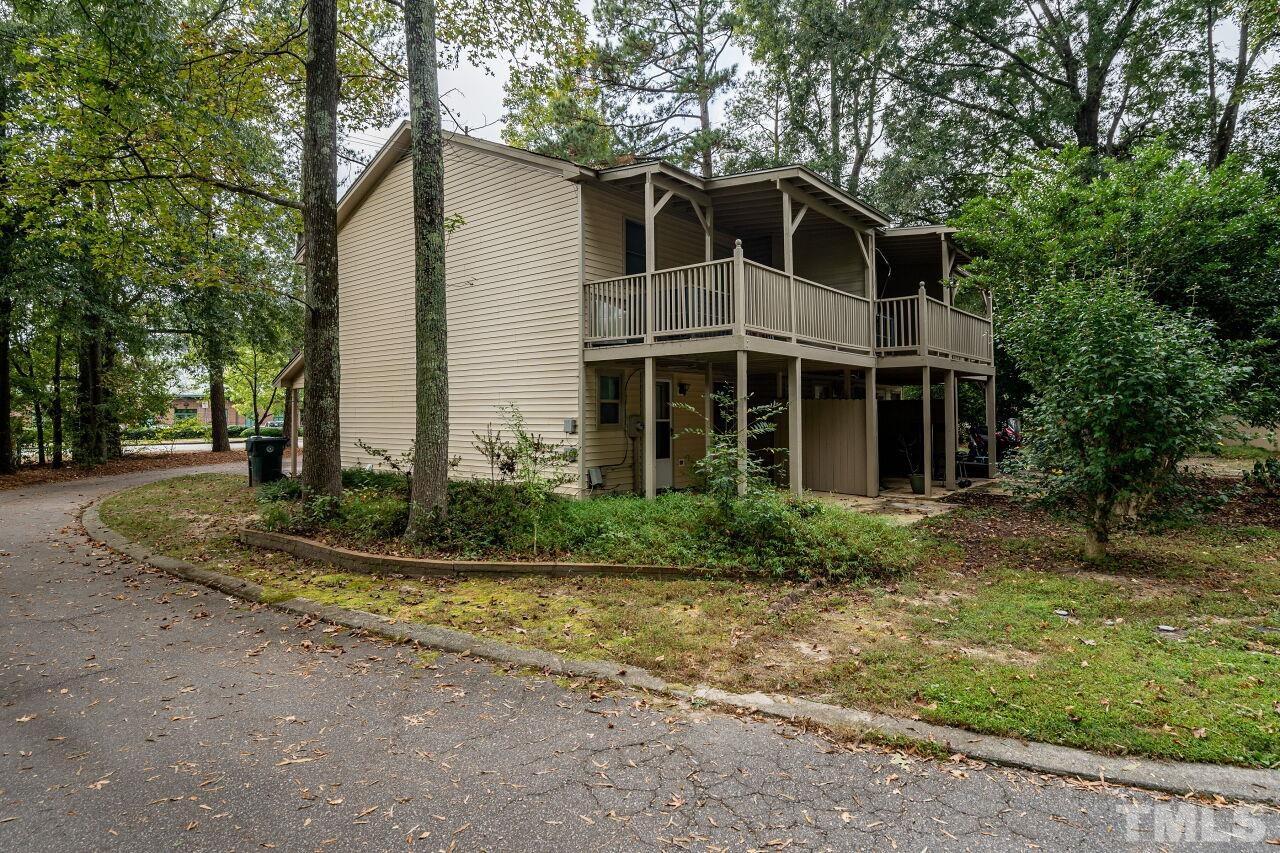 500 Forest Drive Garner, NC 27529 - Photo 5 of 9 a front view of a house with garden