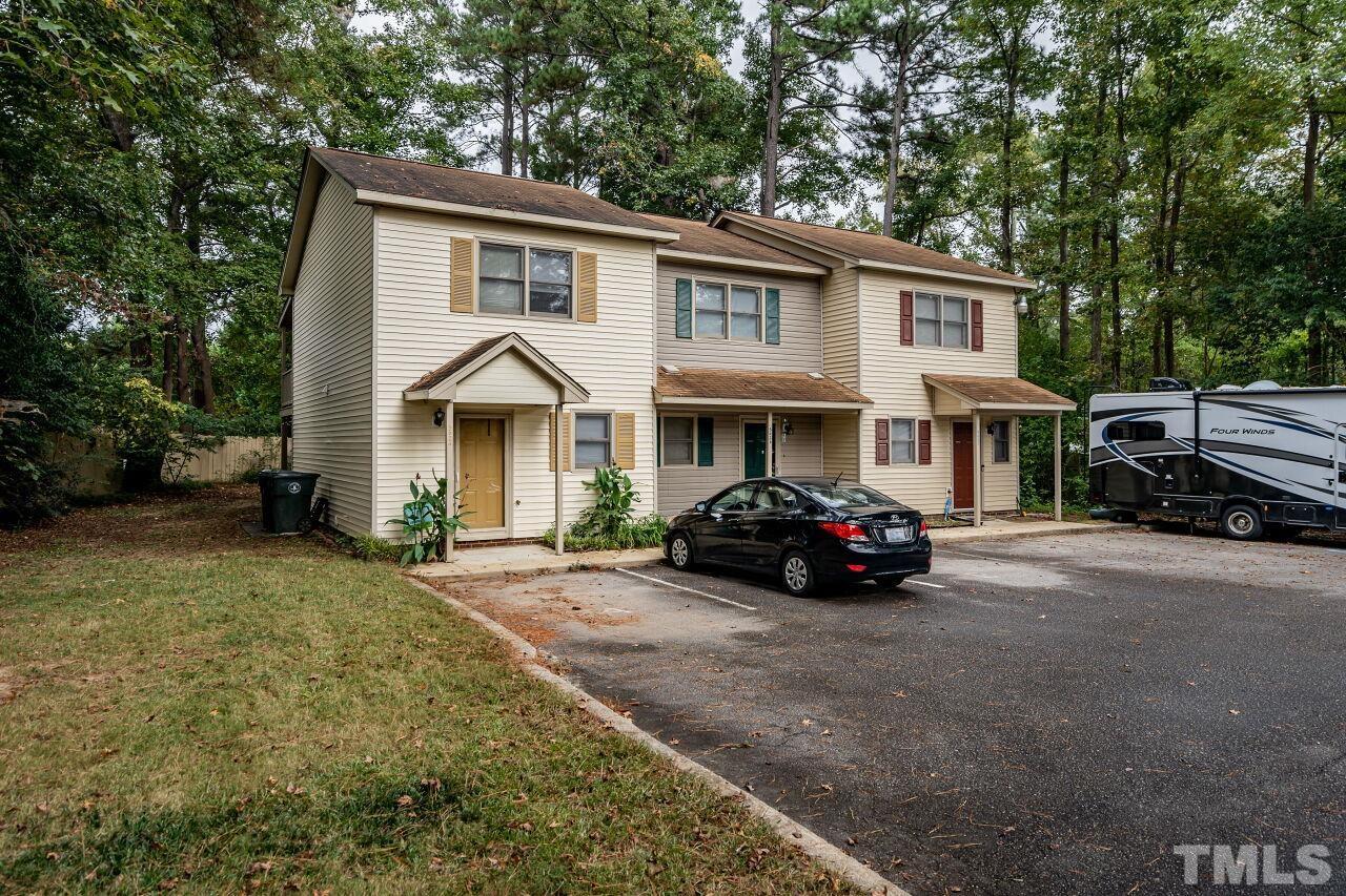 500 Forest Drive Garner, NC 27529 - Photo 8 of 9 a view of house and a car parked in front of house
