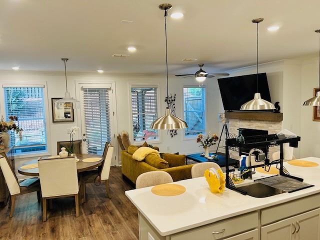 5236 Riden Court Buford, GA 30518 - Photo 15 of 41 a living room with furniture a rug and a chandelier