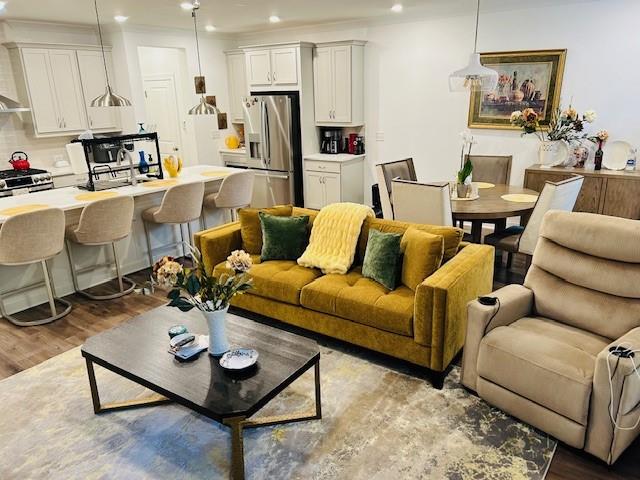 5236 Riden Court Buford, GA 30518 - Photo 17 of 41 a living room with furniture kitchen view and a table