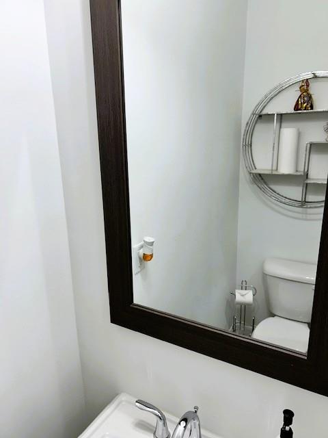 5236 Riden Court Buford, GA 30518 - Photo 19 of 41 a bathroom with a sink and a mirror