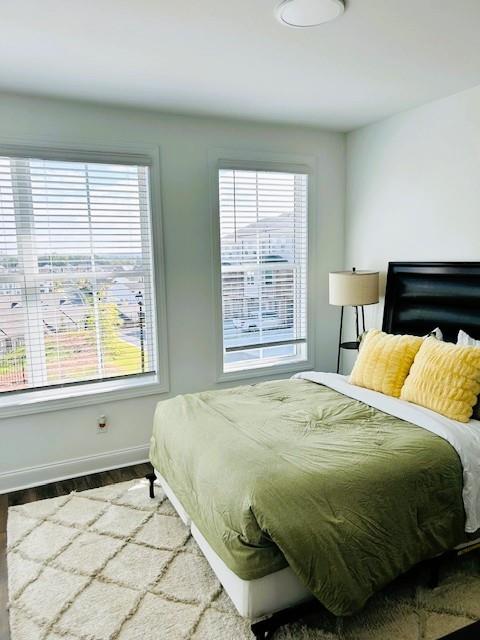 5236 Riden Court Buford, GA 30518 - Photo 24 of 41 a bedroom with a bed and a window