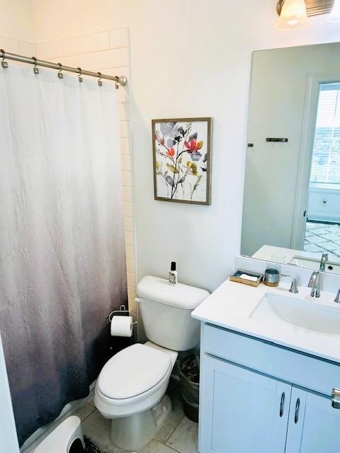 5236 Riden Court Buford, GA 30518 - Photo 25 of 41 a bathroom with a sink mirror and toilet